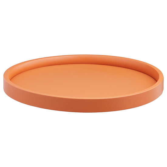 Spice Orange | Image of the Core 14" Round Leatherette Tray in a bright color for boutique hotels.