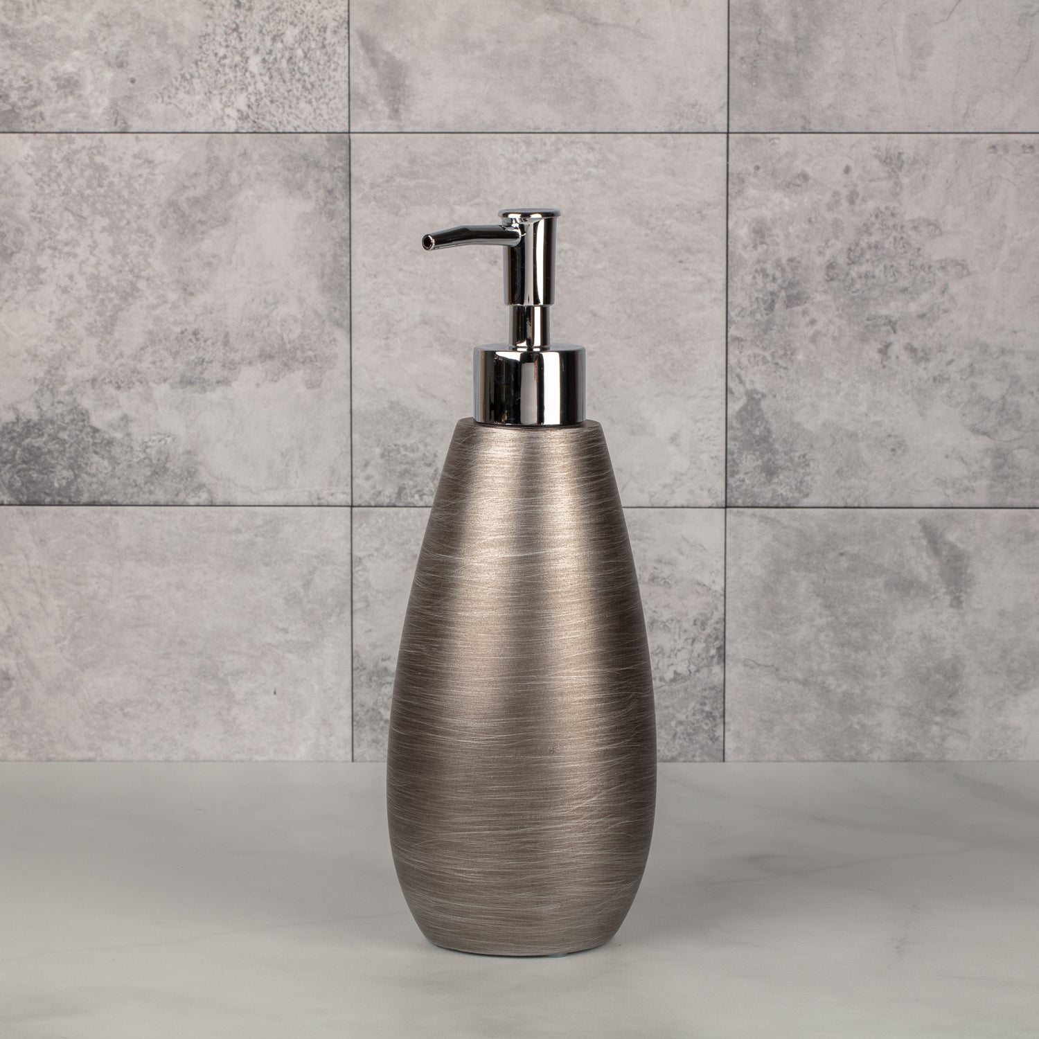 Silver | Urban Oasis lotion pump featuring a smooth finish, perfect for creating a spa-like atmosphere at hotels or restaurant bathrooms.