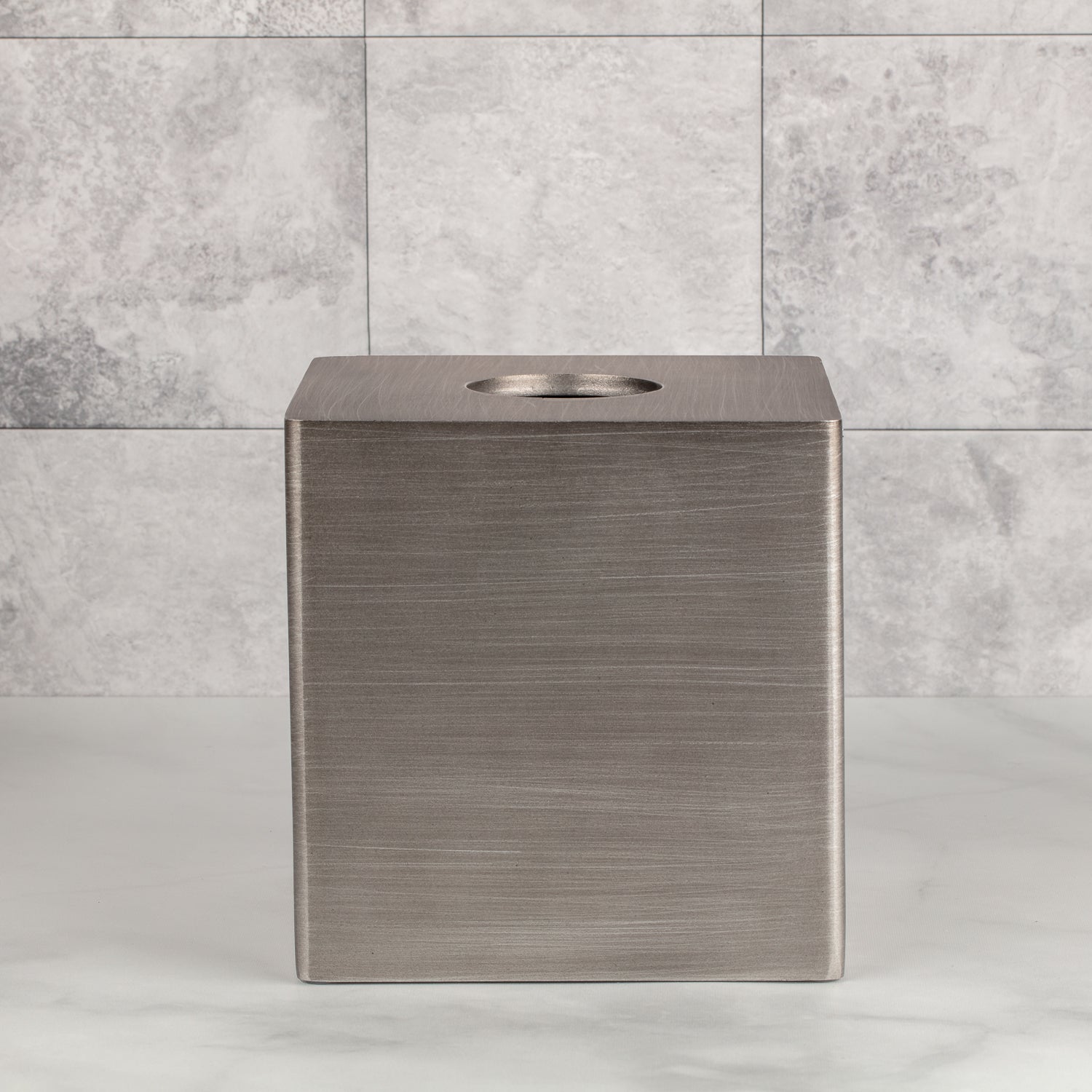 Silver | Urban Oasis tissue box holder designed with practicality in mind, making it easy to replace tissue boxes as needed.