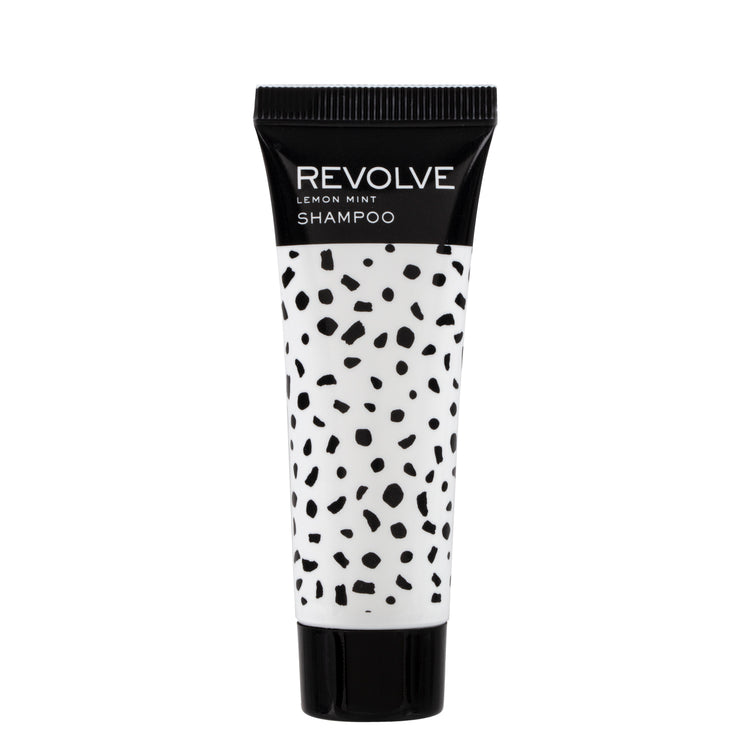 REVOLVE: TERRAZZO 1oz Shampoo bottle featuring a sleek, modern design with terrazzo pattern, perfect for hospitality amenities.