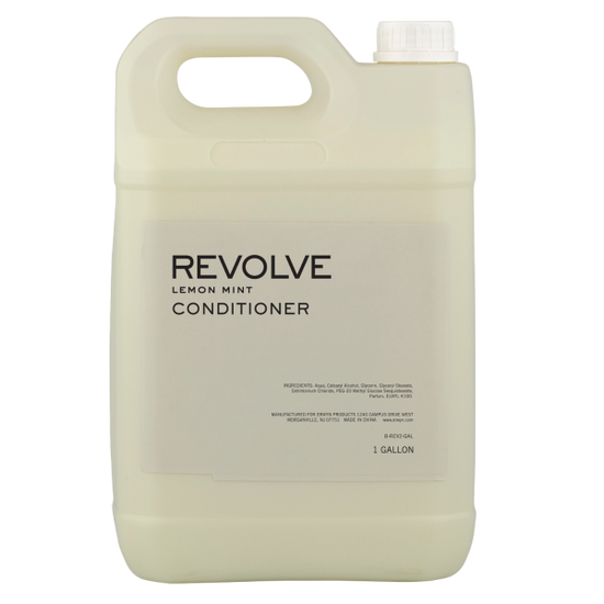 REVOLVE: TERRAZZO 1 Gallon Conditioner in a clear container, labeled with "REVOLVE: TERRAZZO" for bulk use in hospitality settings.